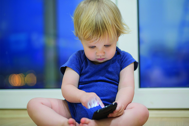 Toddler with phone